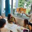 Rencontre entre une architecte et une classe à l’école Lucie Aubrac à Mondeville, 2024. 