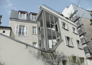 MAISON SUR LE TOIT