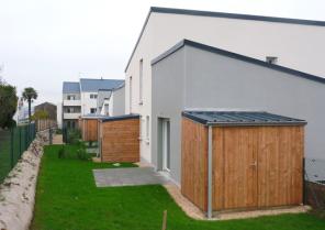 Le pignon à l'extrémité de la séquence des maisons groupées
