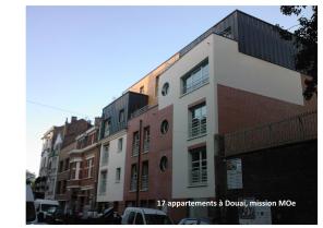 Immeuble de 14 logements et 1 bureau à Dou