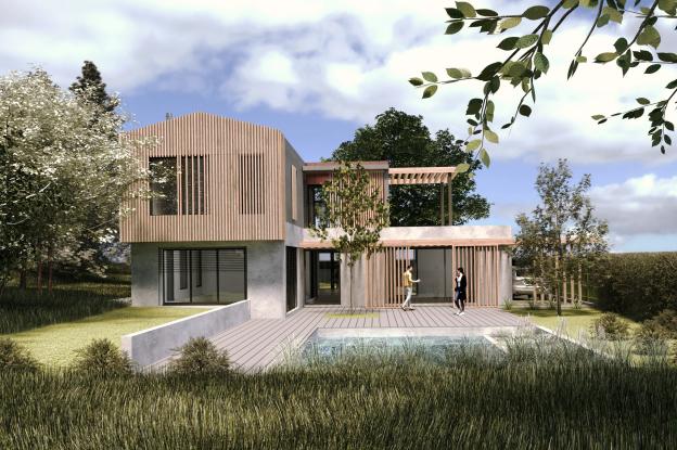 Construction d'une maison sur un terrain végétalisé avec piscine naturelle